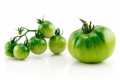 Bunch of Ripe Yellow and Green Tomatoes Isolated royalty free stock photo Bunch of Ripe Yellow and Green Tomatoes Isolated royalty free stock photo