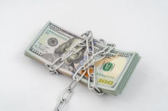 Bundle of American dollars rewound with metal shiny chain