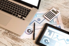 Business Analytics with a Tablet PC and a Laptop royalty free stock photography Business Analytics with a Tablet PC and a Laptop royalty free stock photography