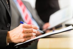 Business - businesspeople, meeting and presentation in office stock images Business - businesspeople, meeting and presentation in office stock images