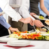 Business catering people take buffet food