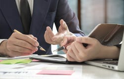 Business Concepts,Management Is Executing The Secretary Is Taking Notes. Stock Photos Business Concepts,Management Is Executing The Secretary Is Taking Notes. Stock Photos