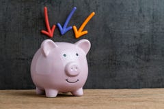 Business or finance saving concept by pink piggy bank on wooden Royalty Free Stock Photography Business or finance saving concept by pink piggy bank on wooden Royalty Free Stock Photography