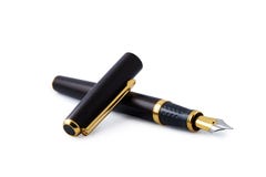 Business golden fountain pen on white