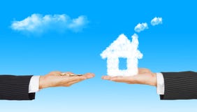 Business Hands with money and house from clouds royalty free stock photography Business Hands with money and house from clouds royalty free stock photography