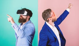 Business implement modern technology. Man with beard in VR glasses and louvered plastic accessory. Guy interact in stock photo Business implement modern technology. Man with beard in VR glasses and louvered plastic accessory. Guy interact in stock photo