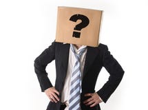 Business man asking for help with cardboard box on his head stock photography Business man asking for help with cardboard box on his head stock photography