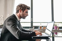 Business man at computer desk stock photo Business man at computer desk stock photo