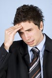 Business man having headache stock photos Business man having headache stock photos