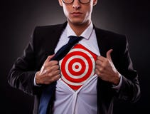 Business man showing a target under his shirt
