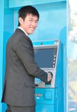 Business man using ATM stock images Business man using ATM stock images