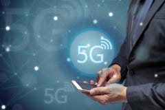 Business man using mobile phone with 5g network wireless technology to connect every communication ,iot internet of things Stock Image Business man using mobile phone with 5g network wireless technology to connect every communication ,iot internet of things Stock Image