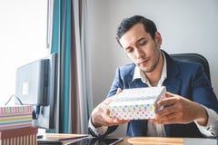 Business manager is checking the present product packaging stock photography Business manager is checking the present product packaging stock photography