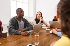 Business meeting. Young team in modern office royalty free stock image Business meeting. Young team in modern office royalty free stock image