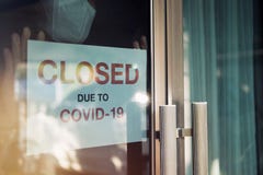 Business office or store shop is closed/bankrupt business due to the effect of novel Coronavirus COVID-19 pandemic. Unidentified