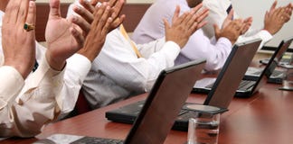 Business people clapping their hands at a meeting royalty free stock images Business people clapping their hands at a meeting royalty free stock images