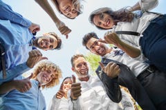 Business people standing in circle showing thumbs up stock photography Business people standing in circle showing thumbs up stock photography