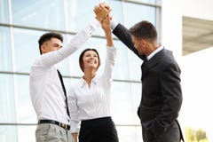 Business People. Successful Team Celebrating a Deal stock photo Business People. Successful Team Celebrating a Deal stock photo