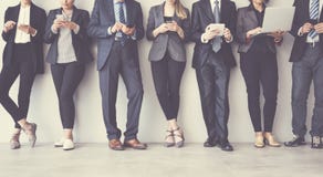 Business people using digital devices stock photo Business people using digital devices stock photo