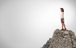 Business person on the top of the rock with copy space royalty free stock photo Business person on the top of the rock with copy space royalty free stock photo