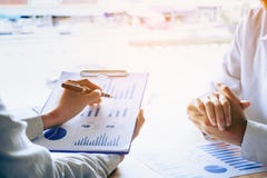 Business personal teaching and looking the summary report data i Stock Images Business personal teaching and looking the summary report data i Stock Images