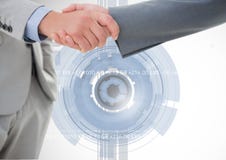 Business professionals shaking hands with handcuff against digital interface in background. Digital composition of business professionals shaking hands against Royalty Free Stock Images Business professionals shaking hands with handcuff against digital interface in background. Digital composition of business professionals shaking hands against Royalty Free Stock Images