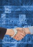 Business professionals shaking hands in handcuffs against coding background. Digital composition of business professionals shaking hands in handcuffs against Royalty Free Stock Photography Business professionals shaking hands in handcuffs against coding background. Digital composition of business professionals shaking hands in handcuffs against Royalty Free Stock Photography