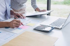 Business team collaboration discussing working analysis with financial data and marketing growth report graph in team, Meeting stock image Business team collaboration discussing working analysis with financial data and marketing growth report graph in team, Meeting stock image