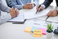 Business team executive accounting analyzing and calculation on valuation data investment fund looking at report, sticky note royalty free stock images Business team executive accounting analyzing and calculation on valuation data investment fund looking at report, sticky note royalty free stock images