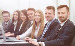 Business team sitting at Desk in the conference room royalty free stock images Business team sitting at Desk in the conference room royalty free stock images