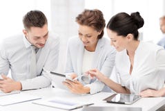 Business team working with tablet pcs in office stock image Business team working with tablet pcs in office stock image