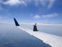 Business Travel Concept, Businessman Flying on Jet