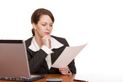 Business Woman In Office Reading Contract Stock Images