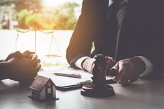 Business woman and lawyers discussing contract papers with brass royalty free stock images Business woman and lawyers discussing contract papers with brass royalty free stock images