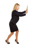 Business woman pushing imaginary wall royalty free stock photos Business woman pushing imaginary wall royalty free stock photos