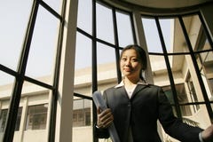 Business women holding folder Royalty Free Stock Images Business women holding folder Royalty Free Stock Images