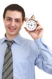 Businessman with an alarm clock in a hand. stock photo Businessman with an alarm clock in a hand. stock photo