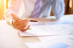 Businessman checking reports stock image Businessman checking reports stock image