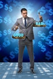 The businessman choosing between good and bad royalty free stock photos The businessman choosing between good and bad royalty free stock photos