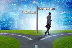 Businessman choosing between hard and easy way stock images Businessman choosing between hard and easy way stock images