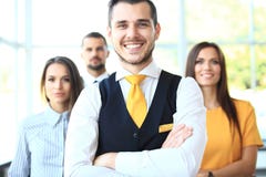 Businessman with colleagues in background Stock Image Businessman with colleagues in background Stock Image