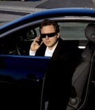 Businessman Getting Out Of A Car Stock Image