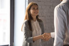 Businessman handshake excited female worker greeting with success royalty free stock images Businessman handshake excited female worker greeting with success royalty free stock images