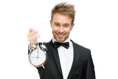 Businessman holding alarm clock royalty free stock image Businessman holding alarm clock royalty free stock image