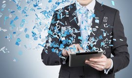 Businessman holding touch pad stock images Businessman holding touch pad stock images