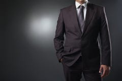 Businessman In Suit On Gray Background Stock Photos Businessman In Suit On Gray Background Stock Photos