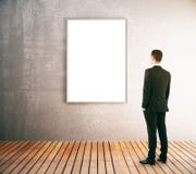 Businessman looking at blank frame Stock Photo Businessman looking at blank frame Stock Photo