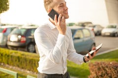 Businessman with mobile phone tablet in hands stock images Businessman with mobile phone tablet in hands stock images