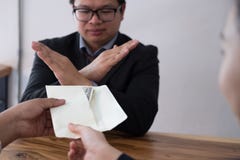 Businessman rejecting money cash banknote from business people. Stock Photography Businessman rejecting money cash banknote from business people. Stock Photography