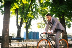 Businessman riding bicycle Stock Photography Businessman riding bicycle Stock Photography